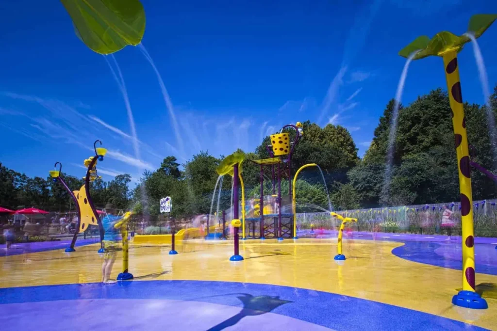 ROARR! splash zone water-play area with jets and sprayers in the sun